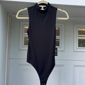 Black sleeveless ribbed mock neck thong bodysuit .  size xs  from EXPRESS Brand